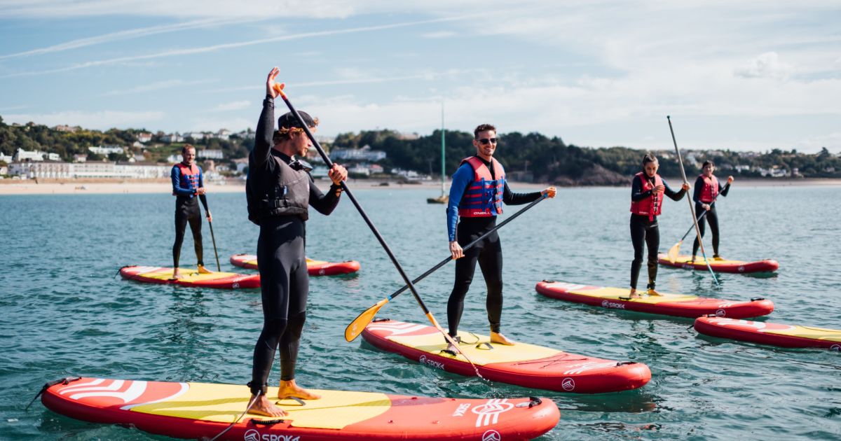 Stand Up Paddleboarding with Absolute Adventures Visit Jersey